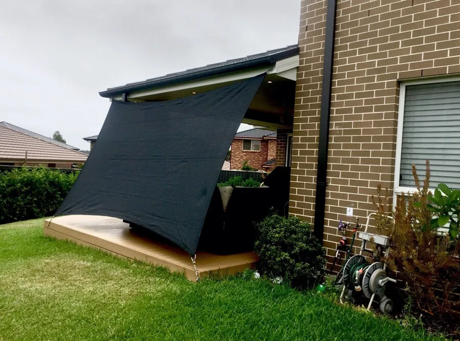 Shade sail as a screen in the UK.webp width=900 height=688